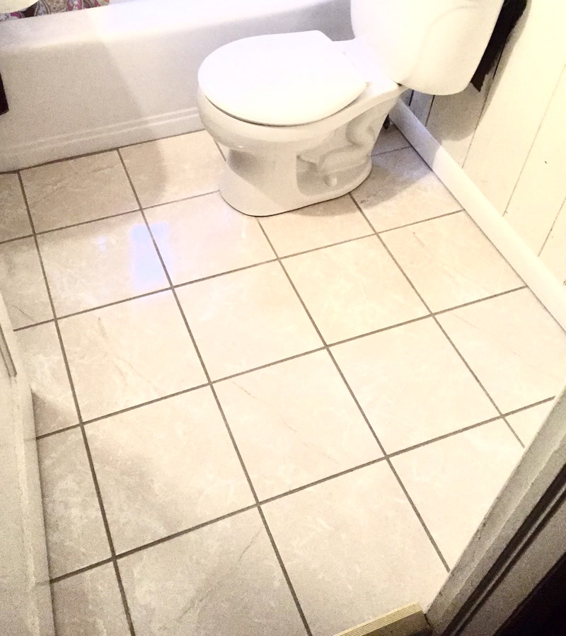 New tile bathroom floor after renovation