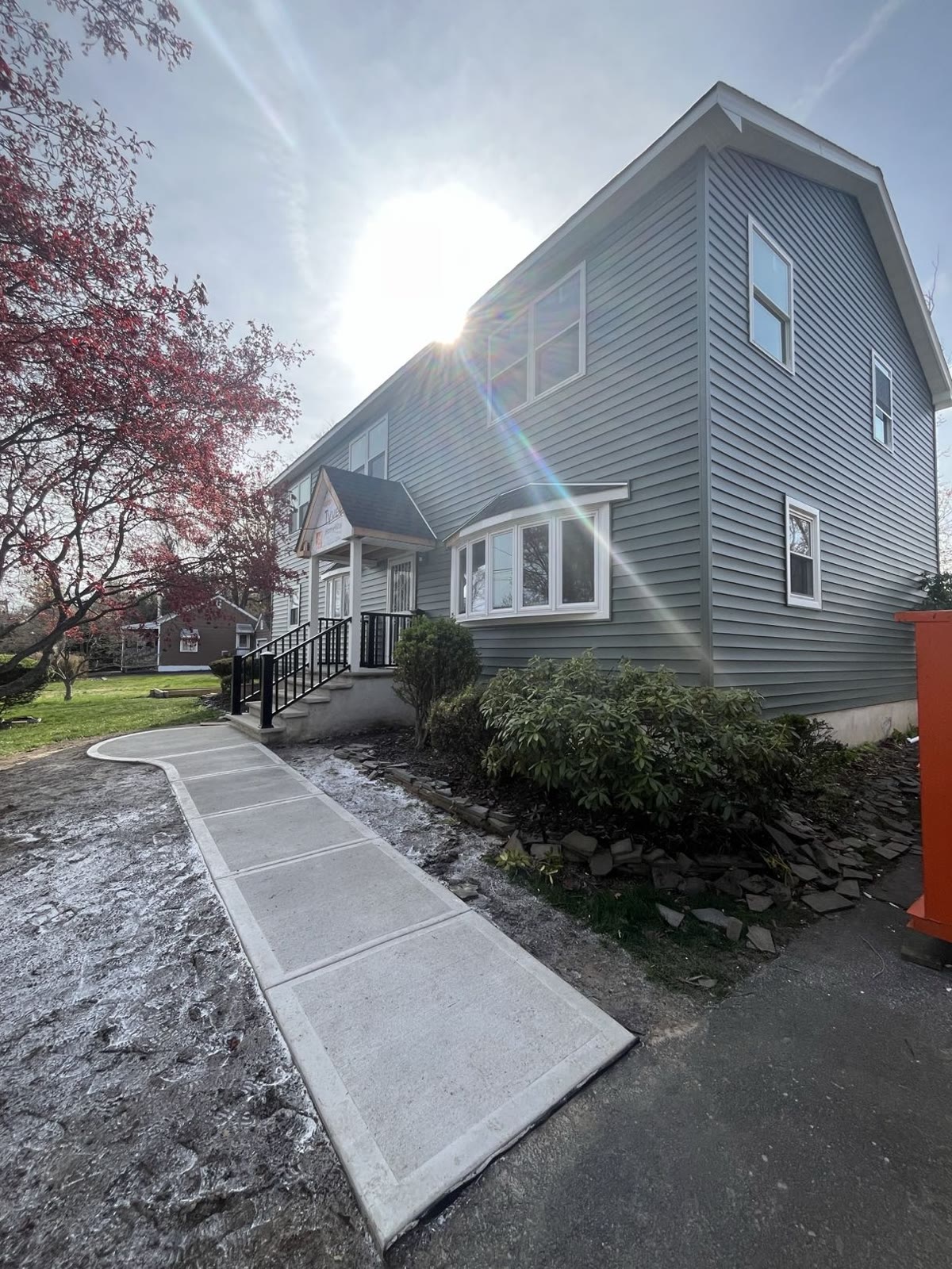 Completed second story addition with new siding