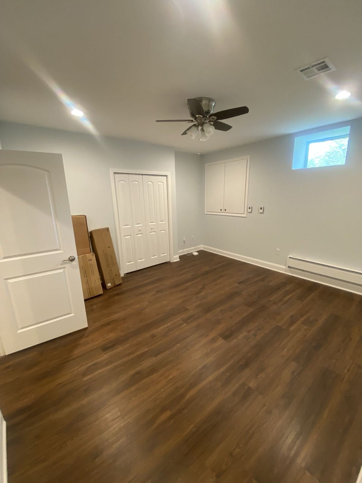 Basement bedroom with egress windows
