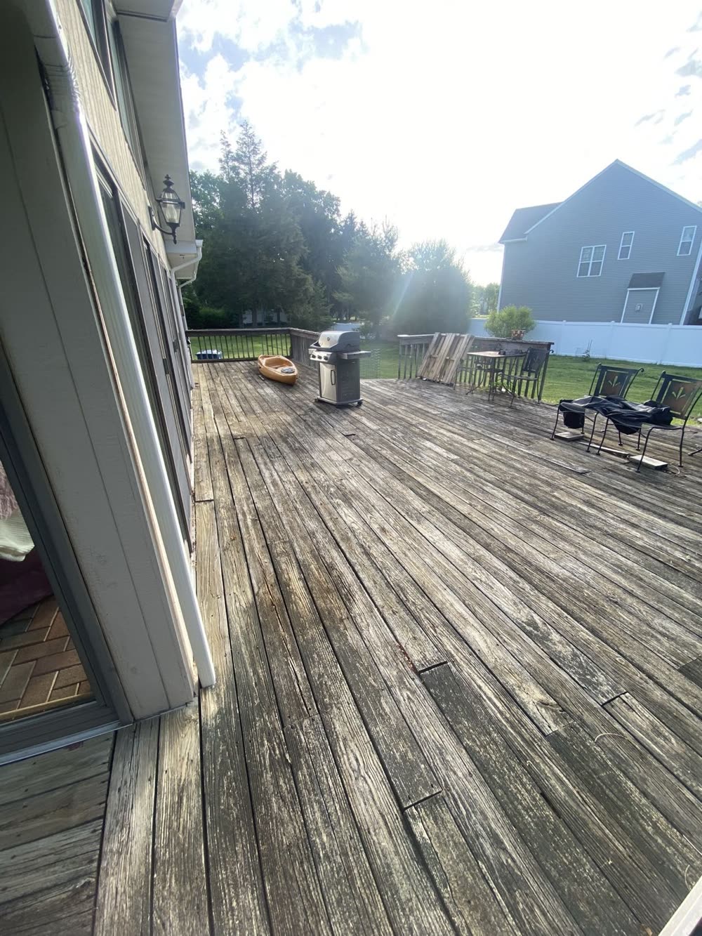 Old weathered wood deck before replacement
