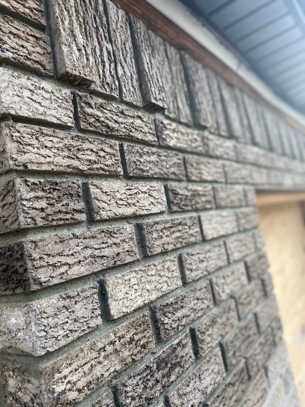 Stone veneer detail on garage