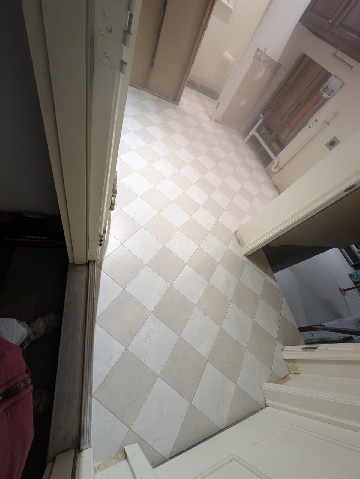 Finished porcelain tile laundry room floor