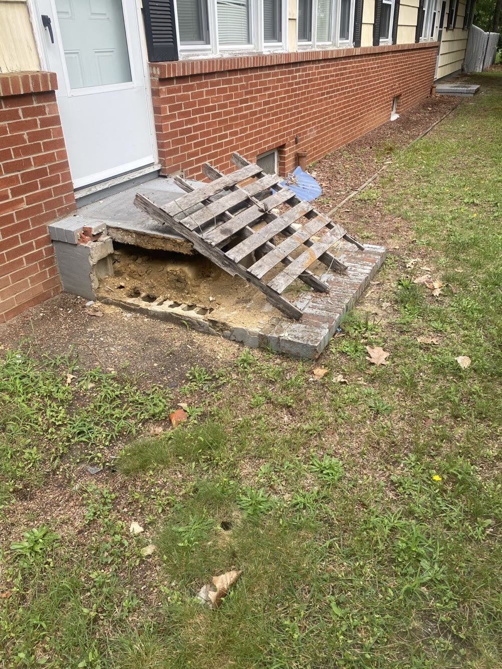 Collapsed front steps before rebuild