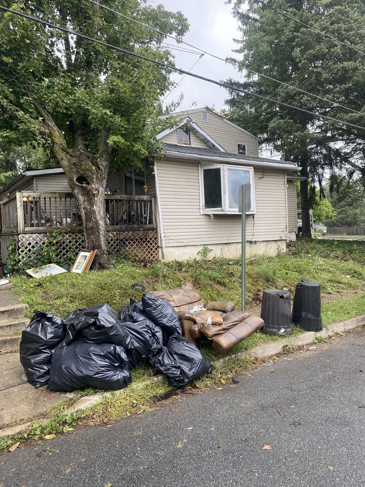 Front of house with debris
