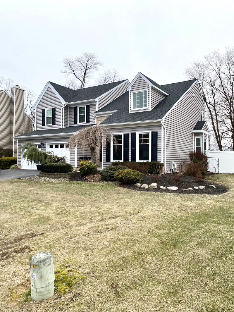 House after roof replacement with new shingles